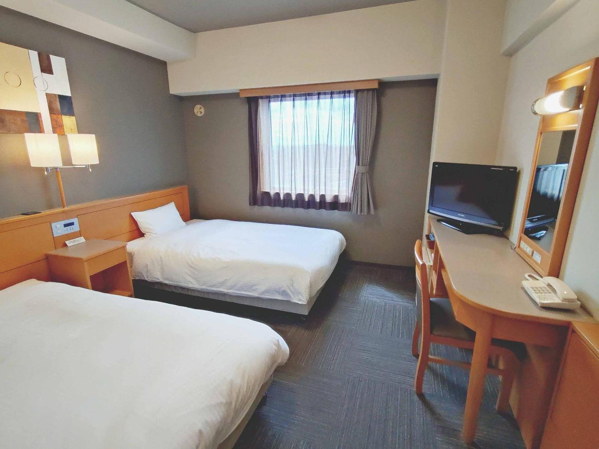 Hotel Route-Inn Toyokawa Inter Esterno foto